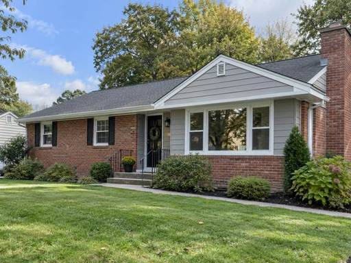 Soft gray siding with crisp fascia details — Connecticut residential design inspiration