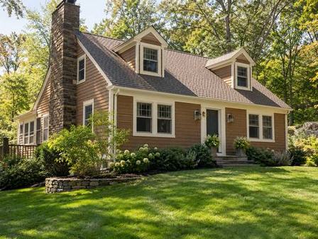 Cream exterior with carefully finished window trim — Connecticut residential design inspiration