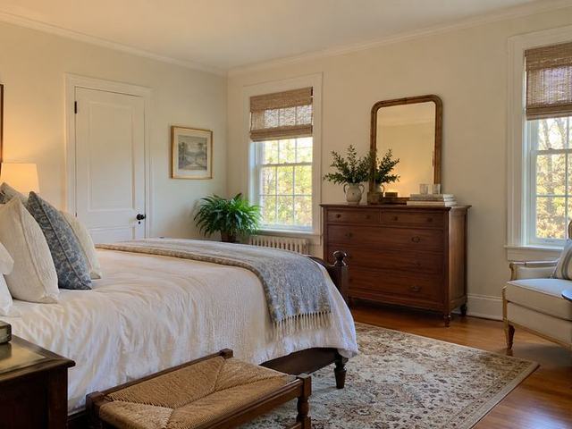 Warm ivory bedroom with a soft matte finish — Connecticut residential design inspiration