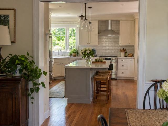 Bright kitchen with a tiled backsplash — Connecticut residential design inspiration